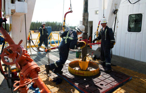 File Photo: Oil Rig Floorhands Work On An Oil Rig At The Cenovus Energy Christina Lake Sagd Project South Of Fort Mcmurray